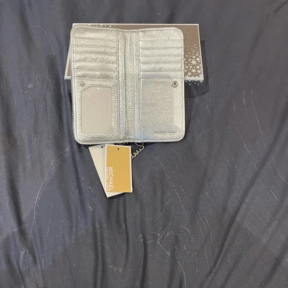 Michael Kors Shimmering Silver Wristlet - Picture 2 of 3